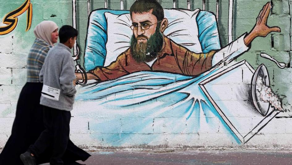 كاريكاتير يجسد إضراب خضر عدنان عن الطعام
